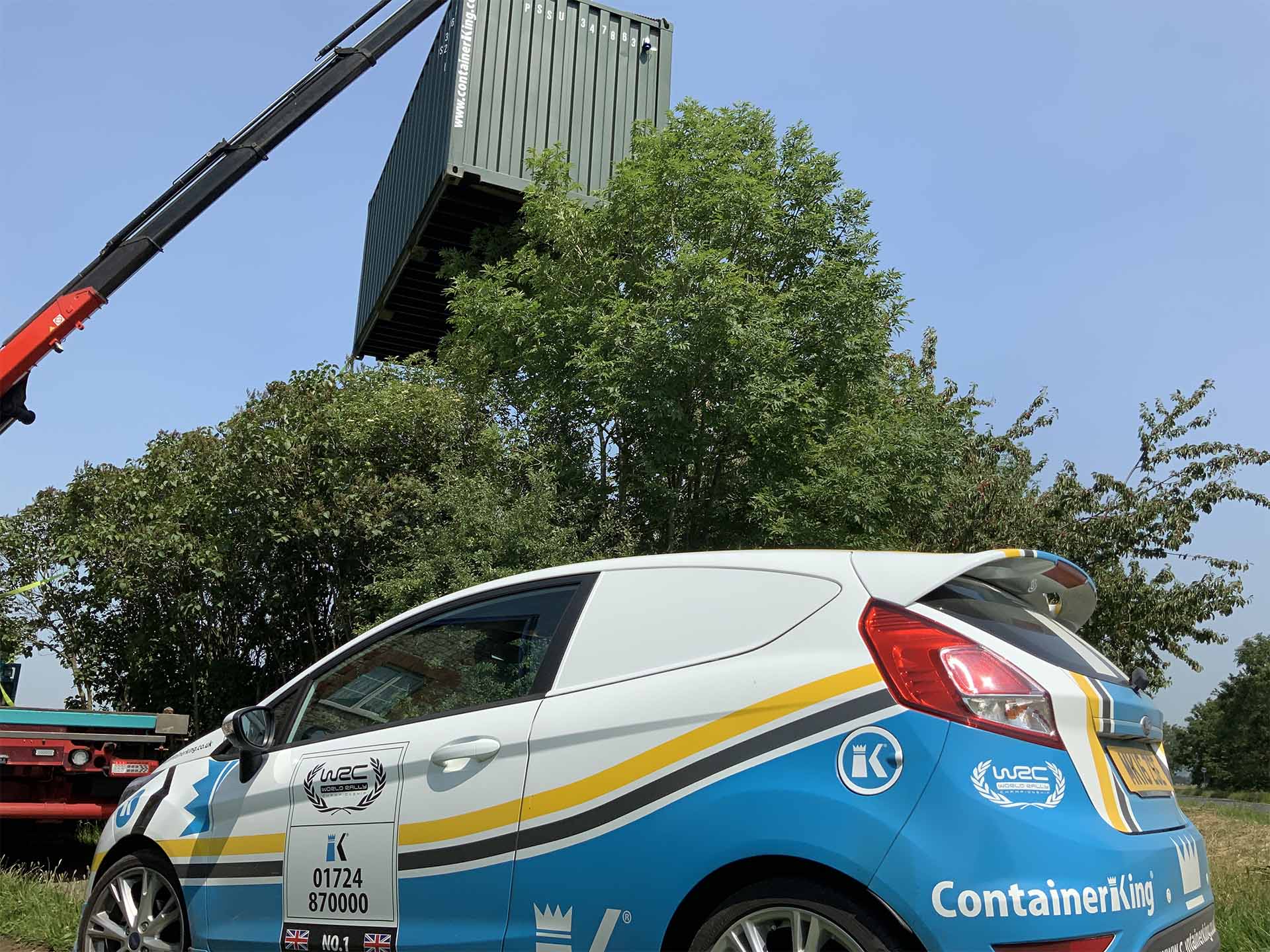 Containerking® vehicle beside an off-site container delivery